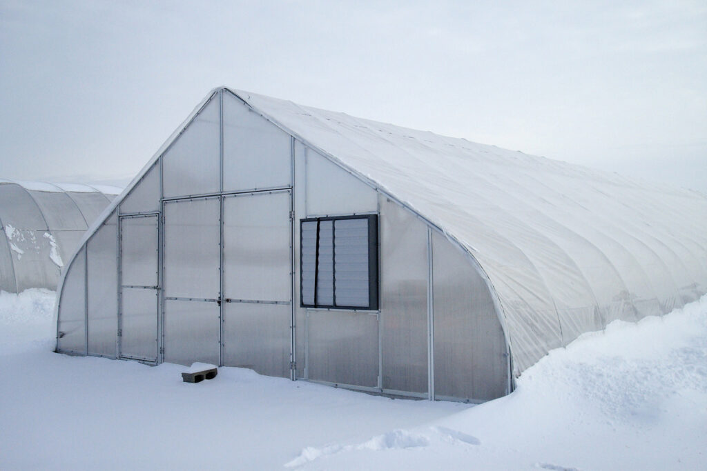 gothic style greenhouse in snow