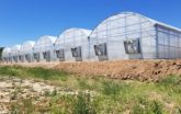 Greenhouse exterior with fans