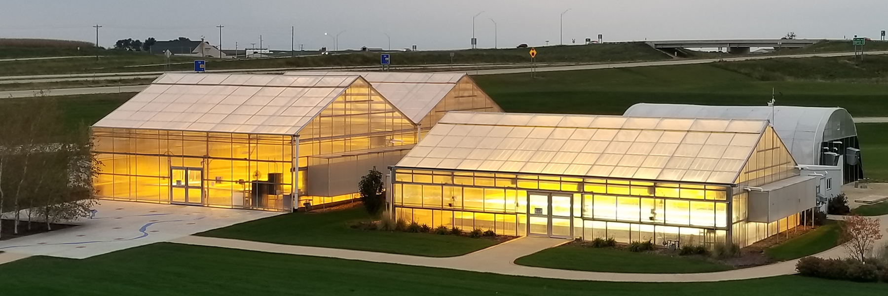 Illuminated greenhouse aerial shot