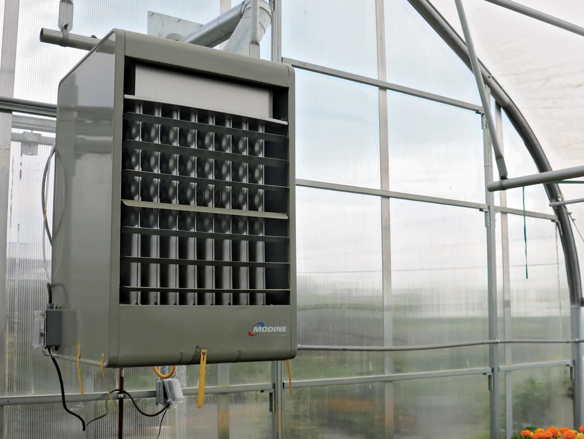 modine heater operating inside year-round greenhouse