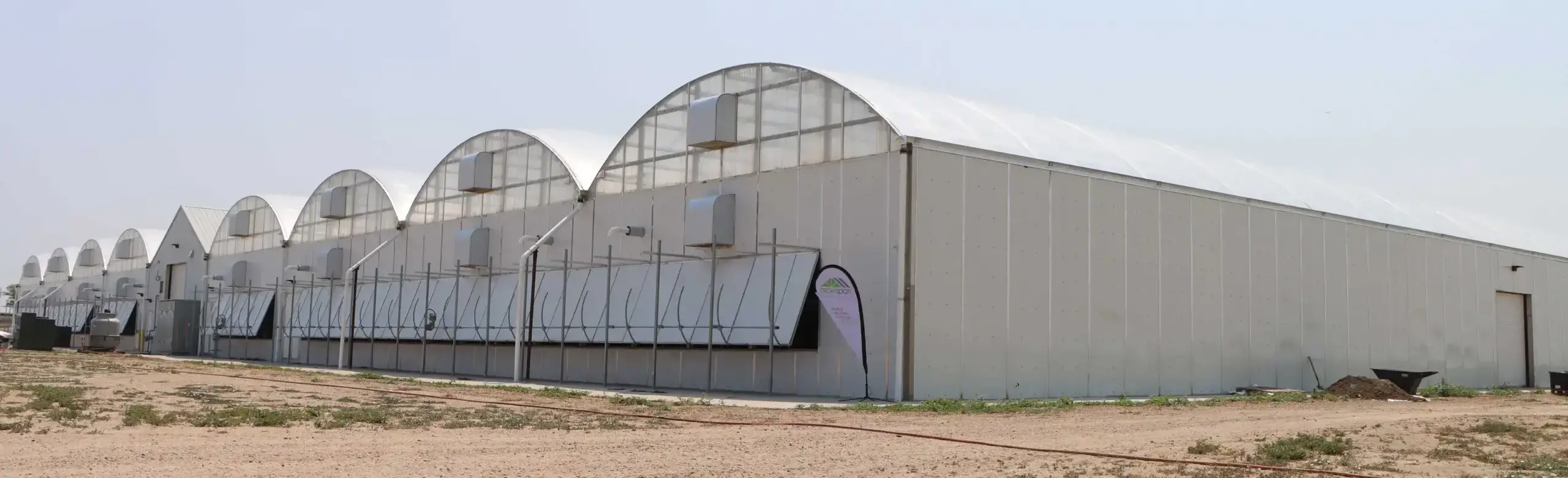 Exterior of a multi-bay hybrid greenhouse