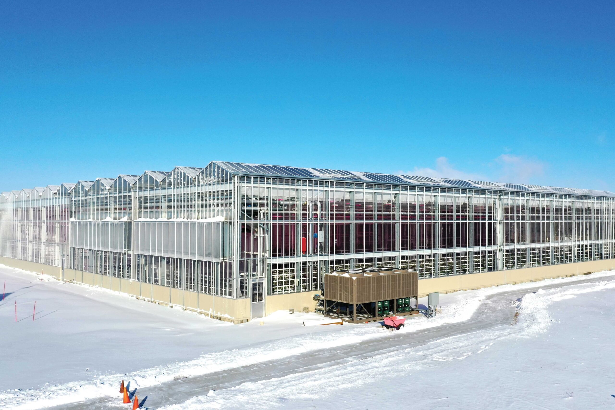 Venlo greenhouse exterior surrounded by snow